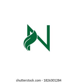 Vector green eco letters logo with leaves. Ecological font N.
