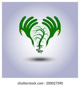Vector green ecology light bulb with tree icon in hands