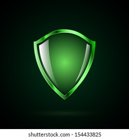 Vector green glossy shield symbol.