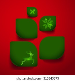 Vector green leaves on red background with Christmas embroidery decoration