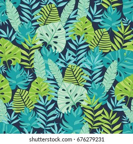 Vector green and navy blue scattered tropical summer hawaiian seamless pattern with tropical green plants and leaves on dark background. Great for vacation themed fabric, wallpaper, packaging.