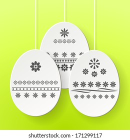 Vector green Paper card with decorated Easter eggs