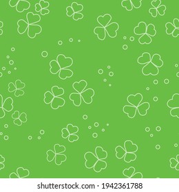 vector green seamless pattern with clovers