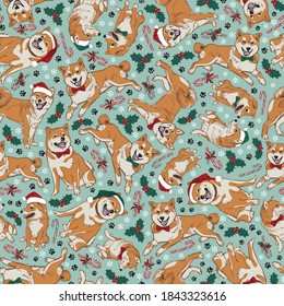 Vector green shiba inu Christmas dogs multidirection seamless pattern with santa hats, holly and candy canes. Perfect for fabric, scrapbooking and wallpaper projects.