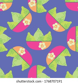 Vector green textured vector limes in pink orange floral bowls. Seamless pattern background. Single motif citrus fruit design on purple backdrop. Hand drawn graphic geometric repeat with tropical vibe