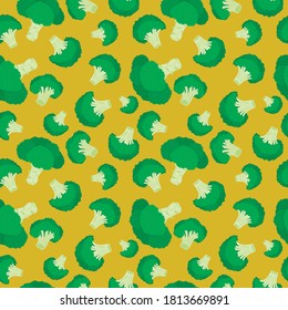 Vector green whole broccoli seamless pattern mustard background. Perfect for textile design, fashion prints, paper backgrounds.