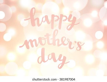 Vector greeting card. Calligraphy brush lettering Happy Mother's Day. Beige background with bokeh lights