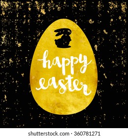 Vector greeting card. Gold foil egg sticker. Calligraphy lettering Happy easter with rabbit