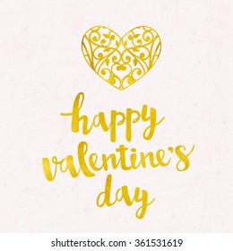 Vector greeting card. Gold foil ornamental heart. Calligraphy brush lettering Happy Valentine's Day. Watercolor paper background.