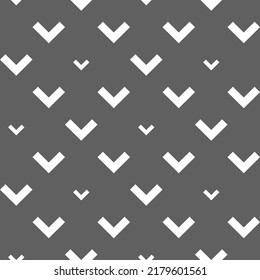 Vector. Grey and white abstract ethnic seamless pattern. Background of angle brackets. Mosaic. Design of packaging paper, textile printing, web design, cover, advertising and typographic products.