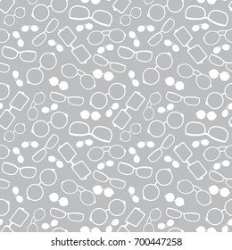 Vector grey and white glasses accessories seamless pattern. Great for eyewear themed fabric, wallpaper, packaging.