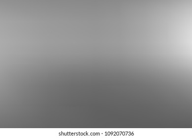 Vector greyscale blurred background. Monochrome defocused black and white smoky banner. Grayscale gradient. Grey or silver abstract backdrop. Blurry unfocused studio light, mist or fog illustration.