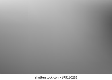 Vector greyscale blurred background. Monochrome defocused black and white smoky banner. Grayscale gradient. Grey or silver abstract backdrop. Blurry unfocused studio light, mist or fog illustration. 