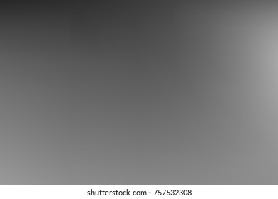 Vector greyscale blurred background. Monochrome defocused black and white smoky banner. Grayscale gradient. Grey or silver abstract backdrop. Blurry unfocused studio light, mist or fog illustration.