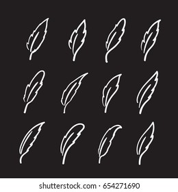 Vector group of hand drawn feather on black background.