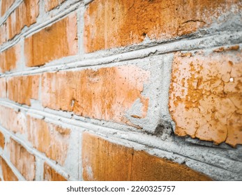 Vector grunge background with the texture of an old brick wall consisting of red bricks. UHD 4K wallpaper. For screen, desktop, website design, overlay, stencil, banner, stylization and polygraph
