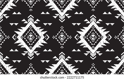 Vector grunge monochrome seamless decorative ethnic pattern. American indian motifs. Background with aztec tribal ornament. Boho style.