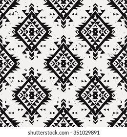 Vector grunge monochrome seamless decorative ethnic pattern. American indian motifs. Background with aztec tribal ornament. Boho style.