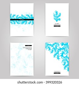 Vector grunge posters set. Blue floral design. 4 paper cards on gray background.