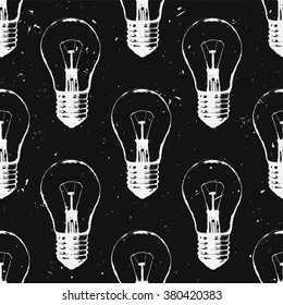 Vector grunge seamless pattern with light bulbs. Modern hipster sketch style. Idea and creative thinking concept.