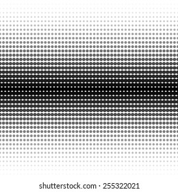 Vector halftone dotted background - seamless. Black and white texture.