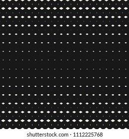 Vector halftone geometric seamless pattern with tiny diamond shapes, rhombuses. Abstract minimal black and white repeatable background with gradient transition effect. Modern dark monochrome design 