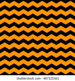 Vector Halloween background. Seamless pattern made of curved lines in the traditional colors of the holiday.