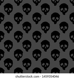 Vector Halloween doodle skulls seamless pattern. Design background for party poster. Hand drawn cartoon illustrationin black over dark grey.