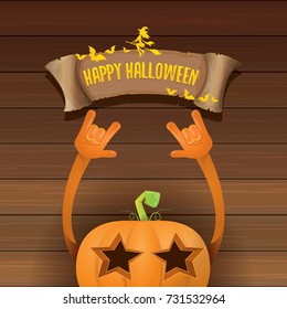 vector halloween funky rock n roll style pumpkin character and vintage ribbon with text happy halloween on wooden background. Happy halloween rock party concept poster, background or greeting card