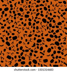 vector halloween seamless pattern - black silhouettes on orange background
