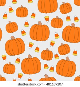 Vector halloween seamless pattern with candy and pumpkins