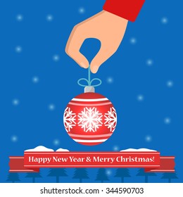 vector. hand with a Christmas toy
