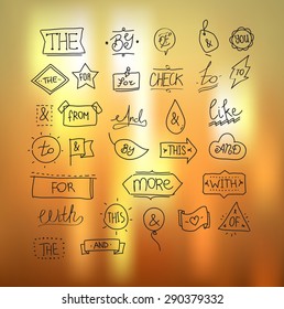 Vector hand drawn ampersands and catchwords. Hand lettering with decorative design vintage elements isolated on blurred background