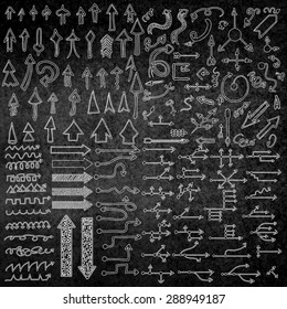 Vector hand drawn arrows icons set on the black blackboard or chalkboard. Abstract vector illustration.