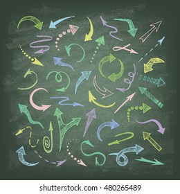 Vector hand drawn arrows icons set on the green blackboard. Abstract vector illustration.