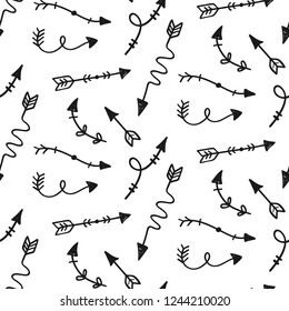 Vector hand drawn arrows seamless pattern, isolated on white.