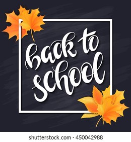 vector hand drawn back to school lettering with frame, realistic maple leafs and greetings label on blackboard background. Can be used as card or poster.