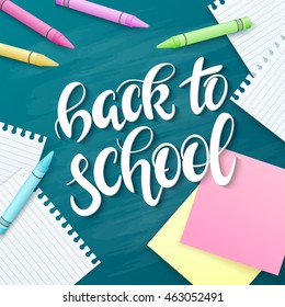 vector hand drawn back to school lettering greetings label - back to school - with realistic paper pages, pencils and dahlia flowers on chalkboard background. Can be used as greetings card or poster.