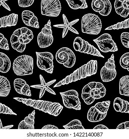 Vector hand drawn black and white seamless pattern of seashells in the engraving vintage style.