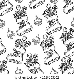 Vector hand drawn black and white seamless pattern of Christmas stocking full of candies and Christmas decorations on white background.
