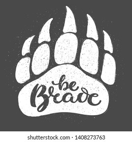 Vector hand drawn brush calligraphy. Quote of lettering is Be brave for motivational and inspirational poster, print, banner, greeting card, t-shirt. With bear paw footstep silhouette and texture