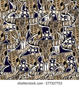 Vector hand drawn buffalo skulls. Tribal elements. Seamless pattern.