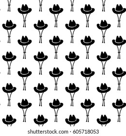 Vector hand drawn cartoon seamless pattern with cowboy hat. Western theme. Black and white cowboy pattern for paper, textile, polygraphy, game, web design