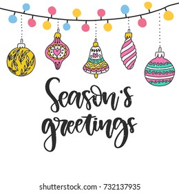 Vector hand drawn Christmas lettering - Season's greetings. Holiday greeting card template