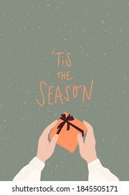 Vector hand drawn  Christmas postcard with quote : tis the season. Hands holding a gift box with ribbon