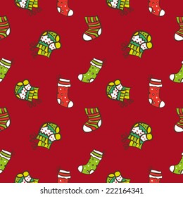Vector hand drawn doodle Christmas or New Year seamless pattern. Winter background with socks