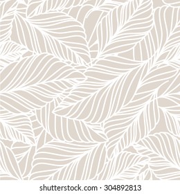 Vector hand drawn doodle leaves seamless pattern. Light pastel beige background. Autumn nature illustration.