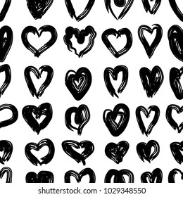 Vector hand drawn doodle seamless background with hand drawn hearts.