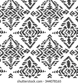 Vector hand drawn ethnic seamless pattern with tribal abstract elements in black white doodle sketch style