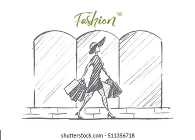 Vector hand drawn Fashion time concept sketch. Stylish woman in dress and hat walking alone with many shopping bags. Lettering Fashion time